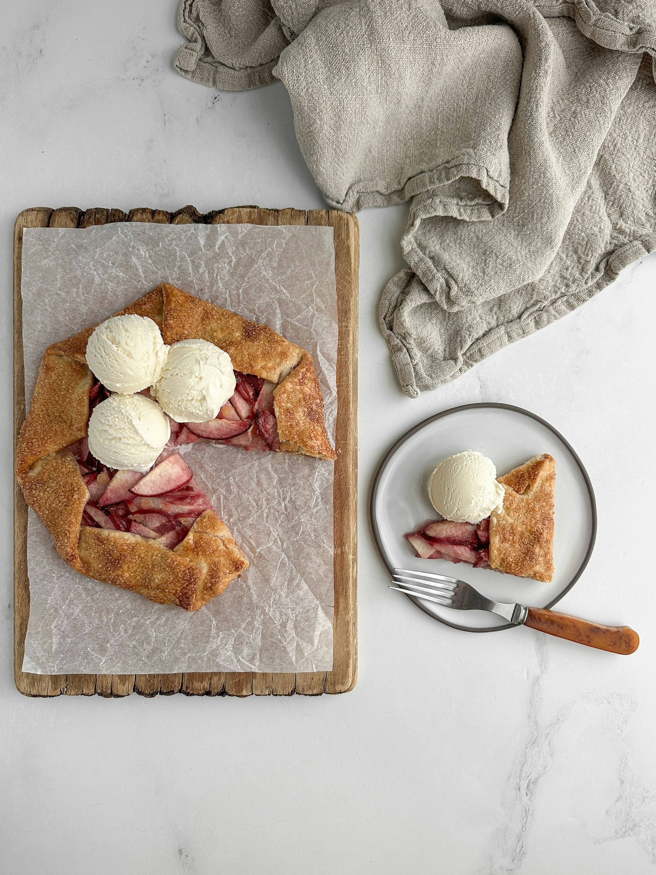 Representative rustic fruit galette with vanilla ice cream